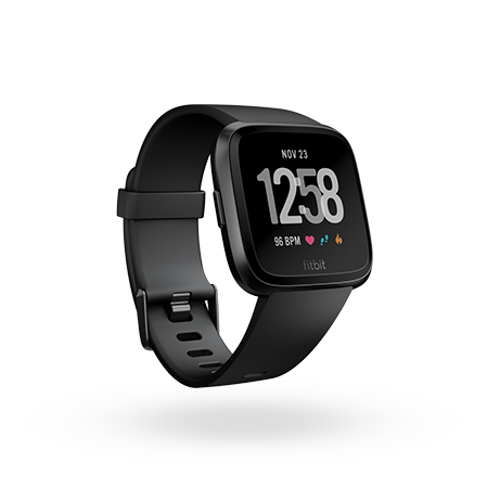 Fitbit Versa smartwatch with a clock face that shows the date, time, and heart rate.